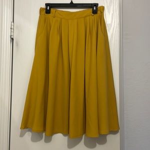 Mustard yellow mid length skirt